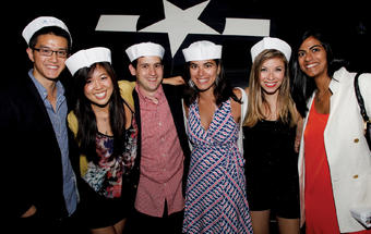 Young alumni party aboard the U.S.S. Intrepid. Photo: Michael DiVito